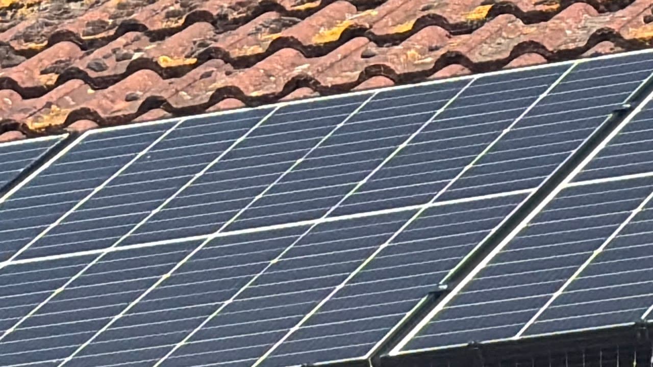 Solar panels installed across a tiled roof in Bristol